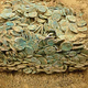 Image for article titled Two men using metal detectors discover hoard of 50,000 Iron Age Celtic coins